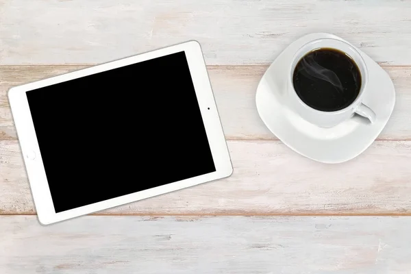 Moderne digitale tablet met koffie — Stockfoto