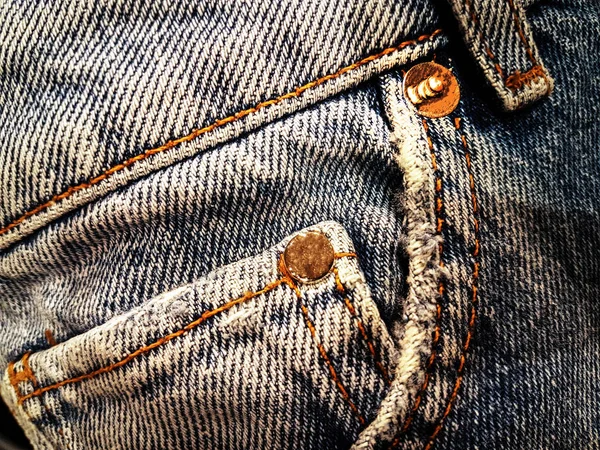 Old faded blue jeans — Stock Photo, Image