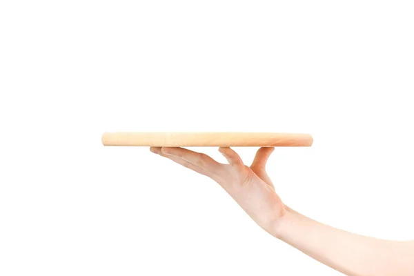 Wooden tray on a hand — Stock Photo, Image