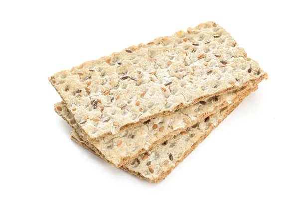 Stos Suchego Chrupiącego Chleba Pełnoziarnistego Izolowany Białym Tle Zbliżeniu — Zdjęcie stockowe