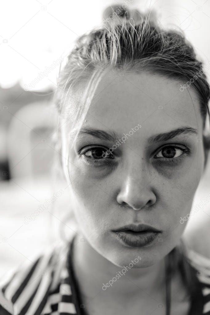 Emotional portrait of abused, crying, beautiful, young ,caucasian woman in underwear - violence concept