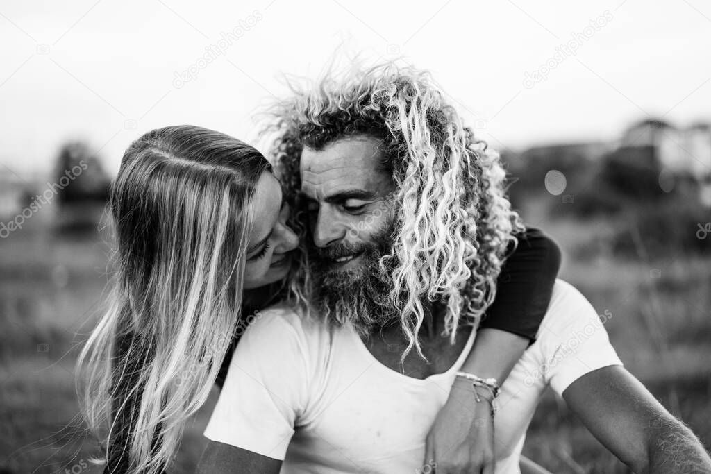 Smiling couple in love outdoors.