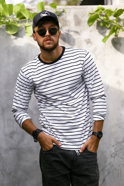 young attractive male model posing in casual wear