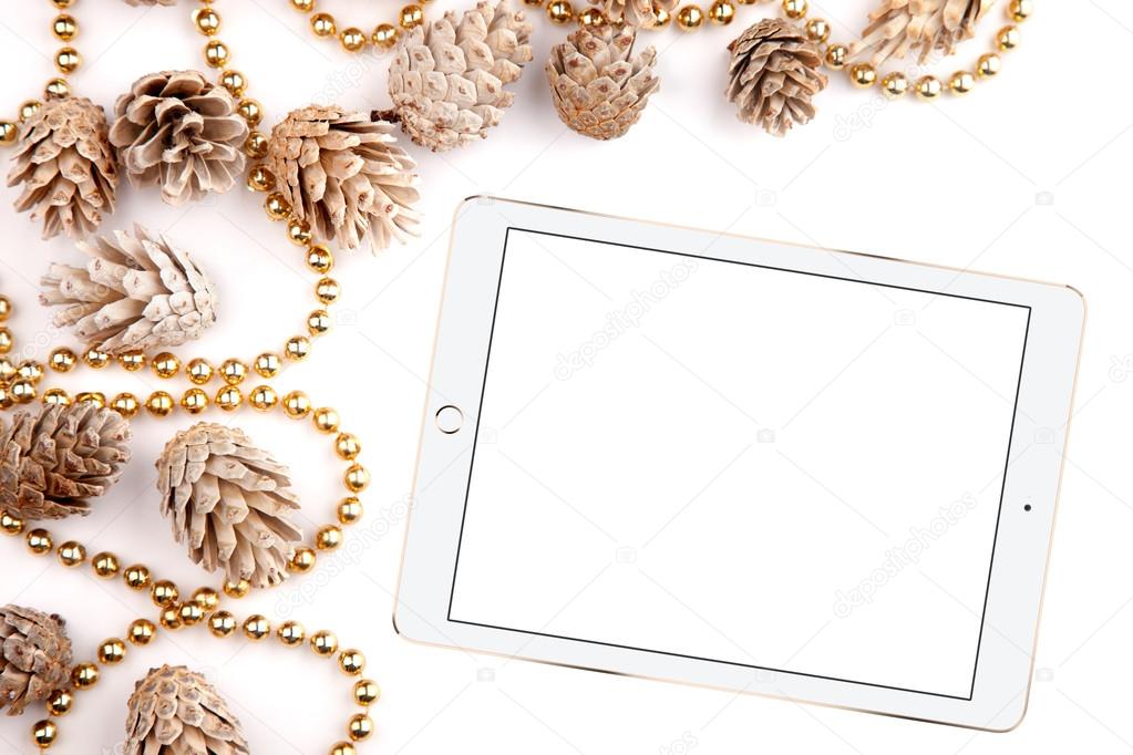 Christmas flat lay mockup desktop, pine cones & tablet on a white background