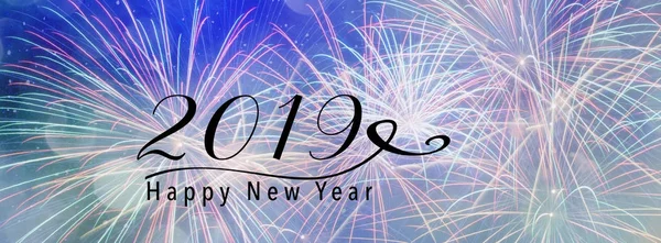 Fireworks against a pink backdrop with bokeh and falling snow effect. Panoramic banner style. Scales down to fit a facebook header size. Happy New Year 2019 quote.