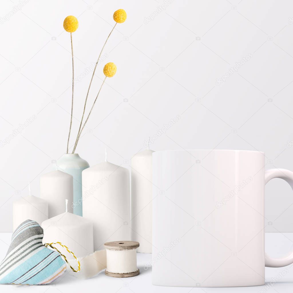 Pretty Mug Mockup setup with candles and sewing items. Great for overlaying your custom quotes and designs for selling mugs.