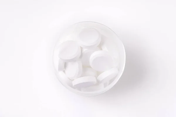 Pile of white tablets — Stock Photo, Image