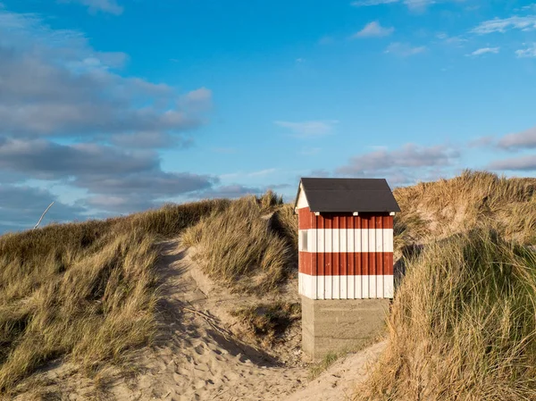 Small red and white striped hut — Stock Photo, Image