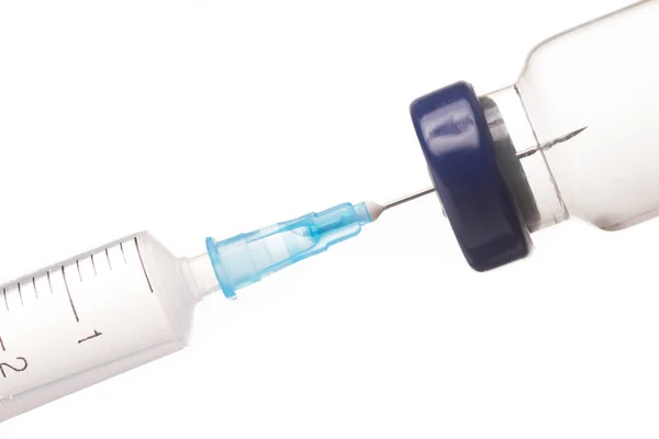 Spruta, nål och medicin injektionsflaska. — Stockfoto