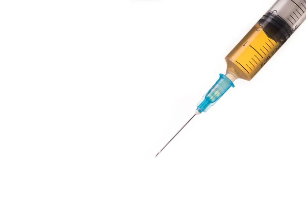 Syringe with brown liquid — Stock Photo, Image