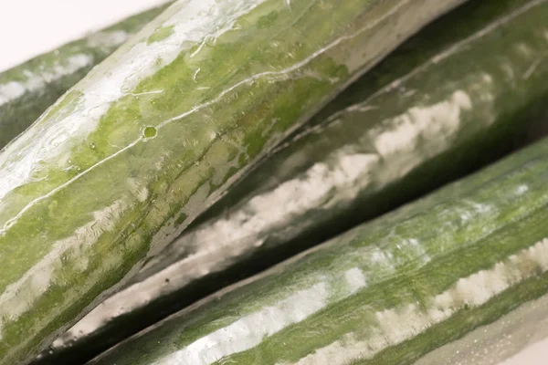 Bunch of cucumber wrapped in plastic films — Stock Photo, Image