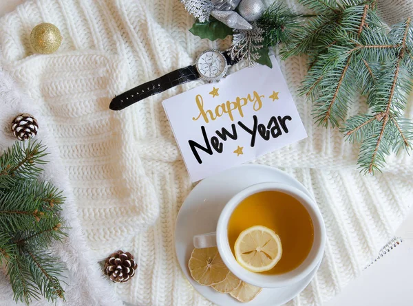 Christmas and New Year flat lay background with greeting hand lettering note — Stock Photo, Image