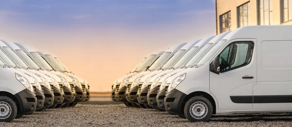 Commercial Delivery Vans Parked Two Rows Transporting Service Company — Stock Photo, Image