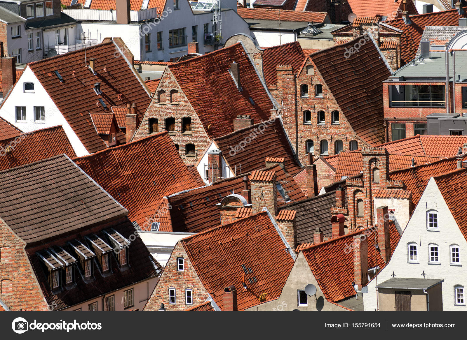 Roofs of traditional red brick houses in the old medieval town of