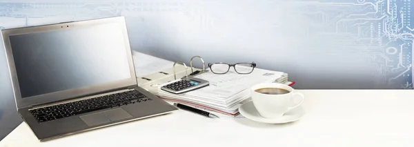 Laptop computer, folder, calculator and a cup of coffee on a white office desk, digital business concept with copy space, panoramic banner format background — Stock Photo, Image