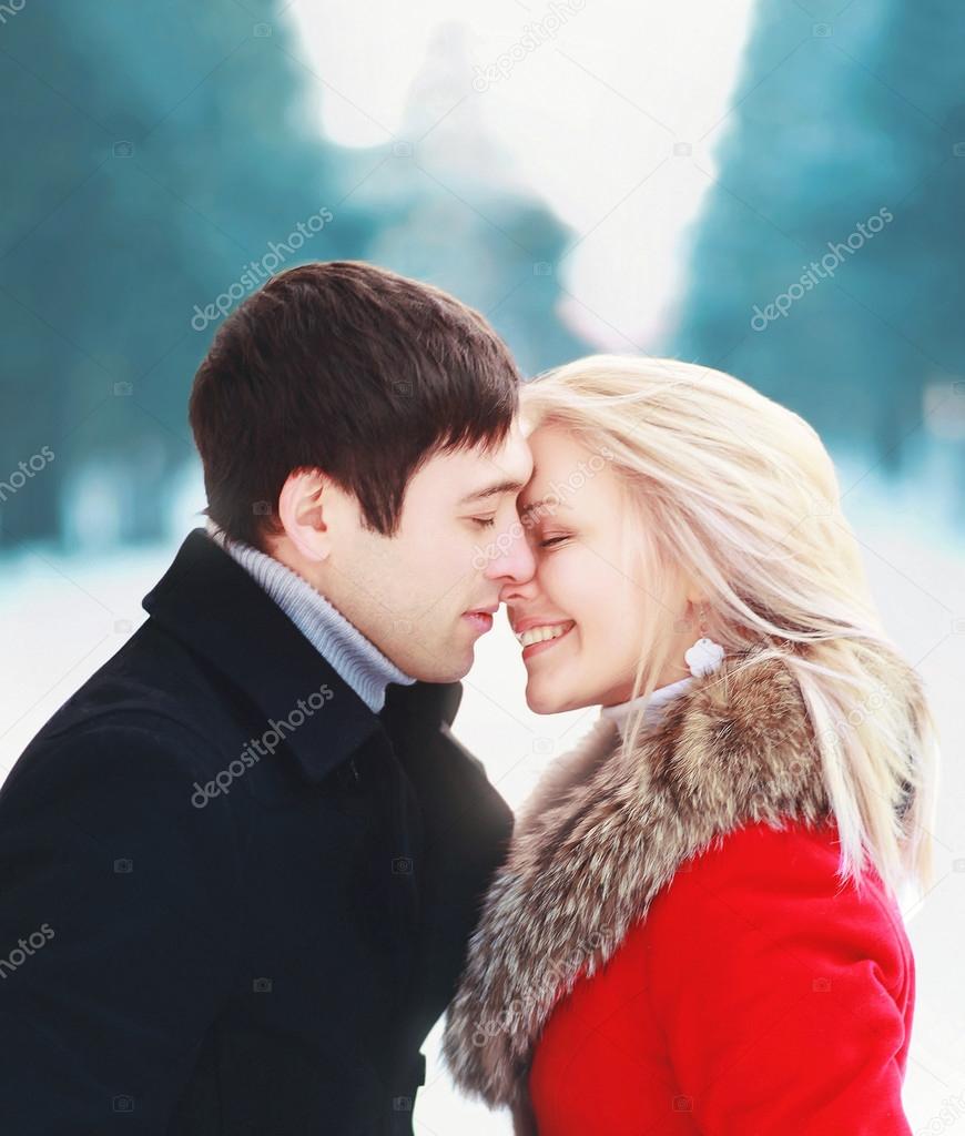 Beautiful romantic sensual couple in love to cold winter day, ge