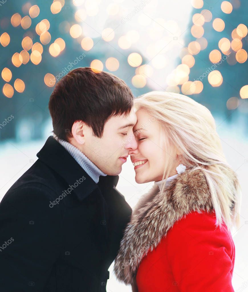 Christmas romantic sensual couple in love to cold winter day ove