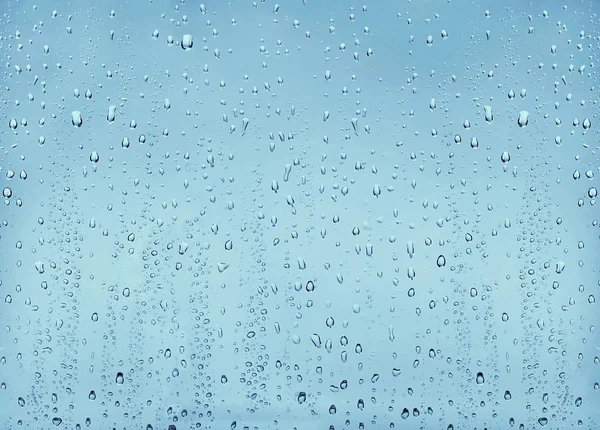 Texture drops of water on the transparent glass background — Stock Photo, Image