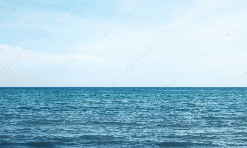 Vacation, travel and background concept - blue sea or ocean with