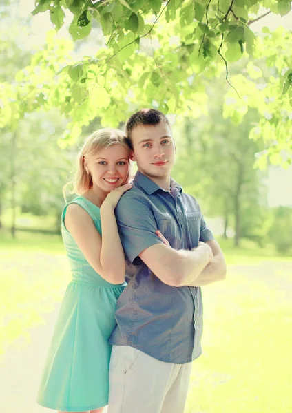 Portrait happy couple walking together at summer park — Stock Photo, Image