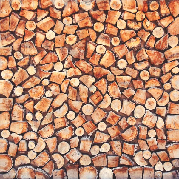 Wooden natural sawn a logs closeup, texture background top view — Stock Photo, Image