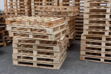 Many pallets stacked in stock, warehouse pallets