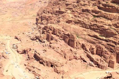Panorama of ancient city of Petra with Royal Tombs seen from High place of sacrifice in Jordan clipart