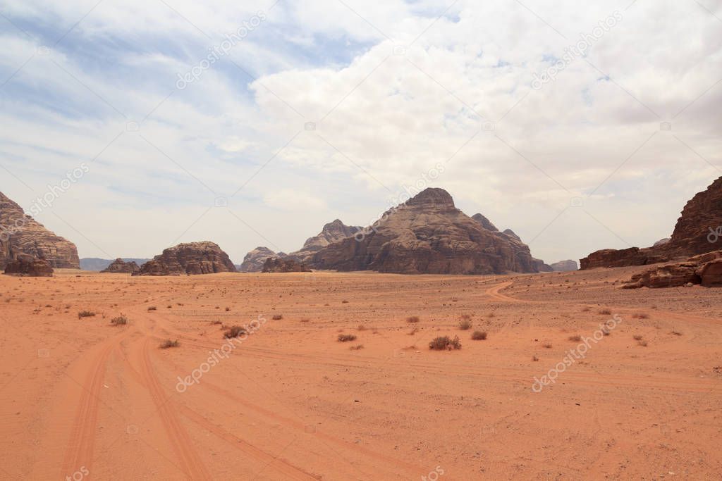 Wadi Rum desert panorama with dunes, mountains and sand that looks like planet Mars surface, Jordan