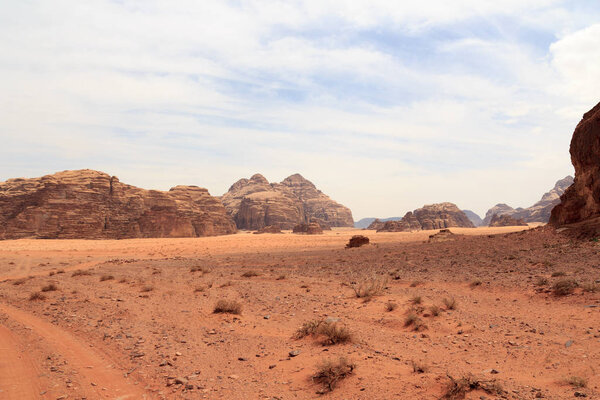 Wadi Rum desert panorama with dunes, mountains and sand that looks like planet Mars surface, Jordan