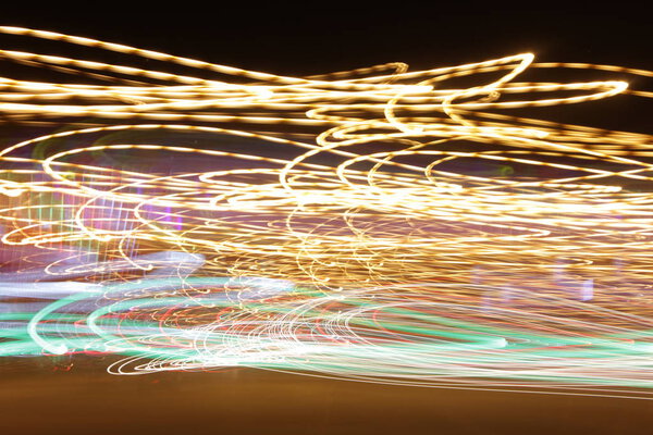 Lighting effect, multicolored striped lines in motion - abstract concept, photo effect - long exposure