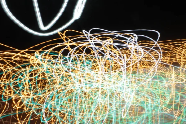 Lighting effect, multicolored striped lines in motion - abstract concept, photo effect - long exposure