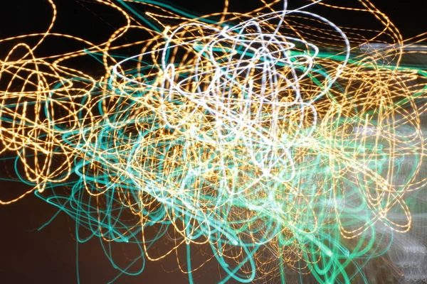 Lighting effect, multicolored striped lines in motion - abstract concept, photo effect - long exposure