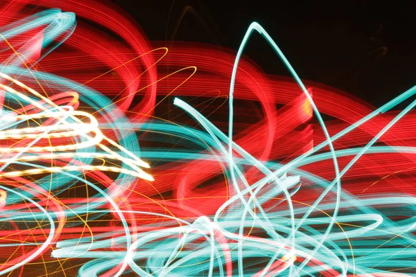 Etkisi aydınlatma, altın - soyut kavram, yangın gibi hareket satırlarında etkisi - uzun pozlama fotoğraf