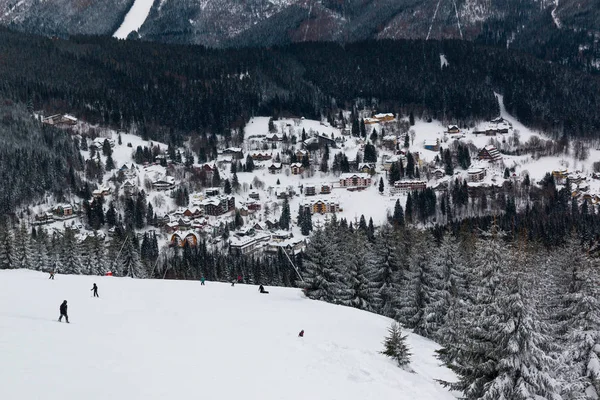 People on mountain in Czech ski resort Spindleruv Mlyn