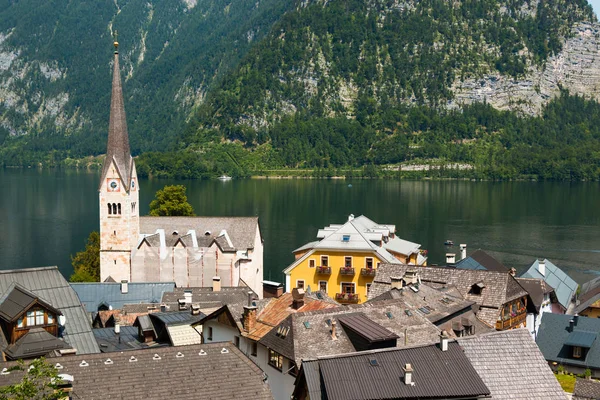 View over roofs of the lake and Hallstatter and Hallstatt Lutheran Church — стоковое фото