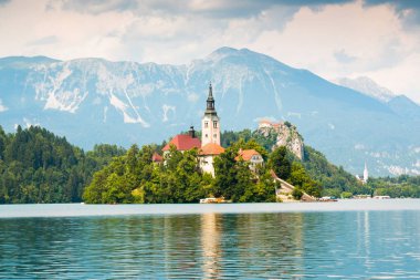 Lake Bled with St. Marys Church on small island in Bled clipart