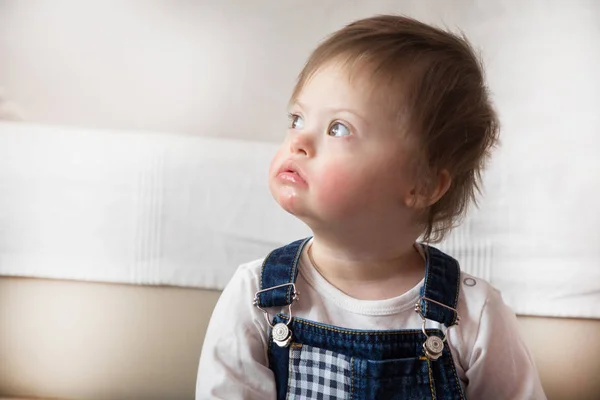 Portrait of cute baby boy with Down syndrome — Stock Photo, Image
