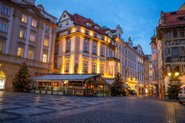 Prague, Czech Republic - 3.12.2019: Christmas city view of the Old Town square in Prague at early morning when all stands are still closed, Czech Republic