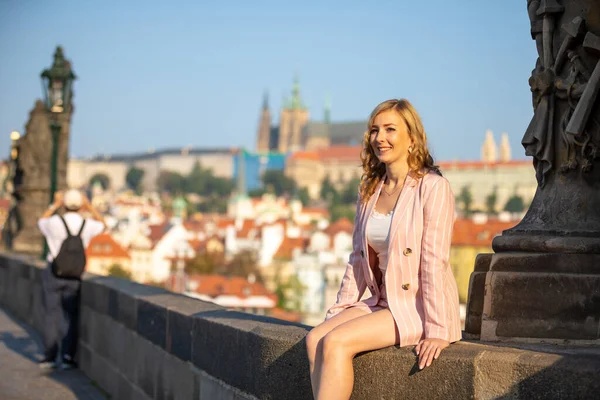 Young Blonde Woman Walks Charles Bridge Prague Sunny Day — Stock Photo, Image