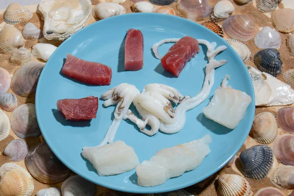 Italian fish dish Sicilian tuna, Tyrrhenian cuttlefish and Mediterranean cod