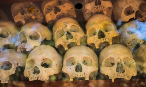 Pile of human skulls on a wat thmei at Siem Reap, Cambodia.