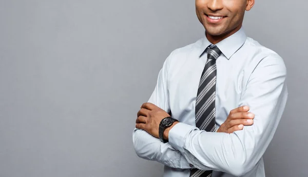 Business Concept - Happy professional african american businessman confident arms crossed.