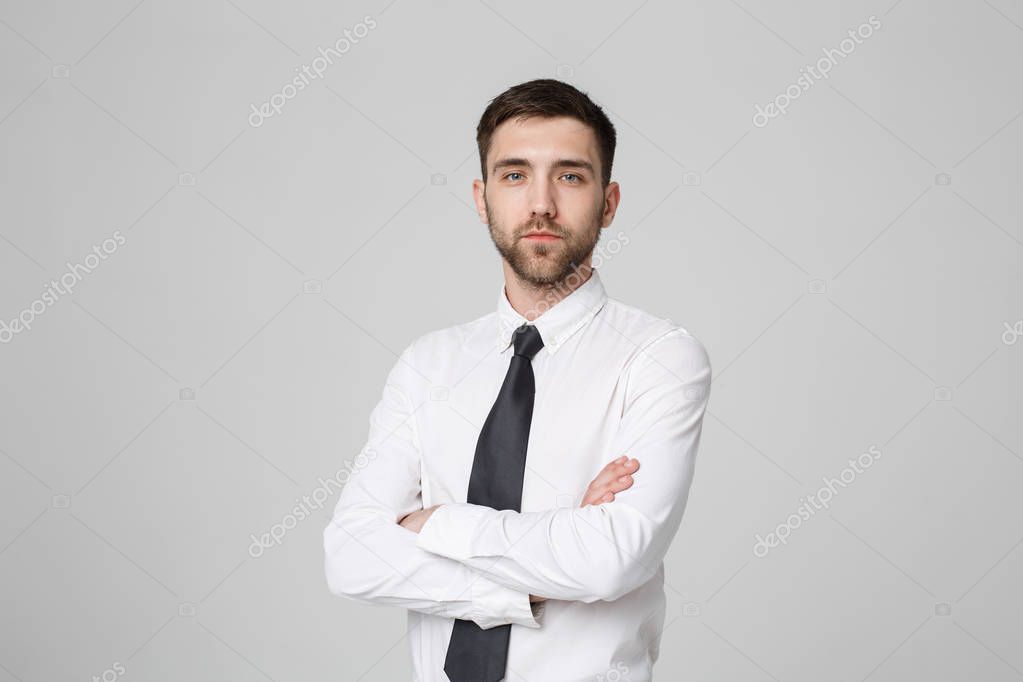 Business Concept - Portrait Handsome Business man crossing arms with confident face. White Background. Copy Space.