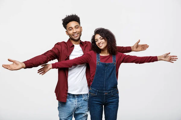 Happy young African couple dressed casually having fun together. — Stock Photo, Image