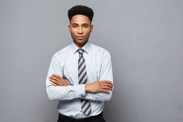 Business Concept - Happy professional african american businessman confident arms crossed.