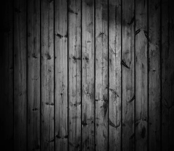 Zwart houten patroon met donkere vignet. Goed gebruik voor productpresentatie. — Stockfoto