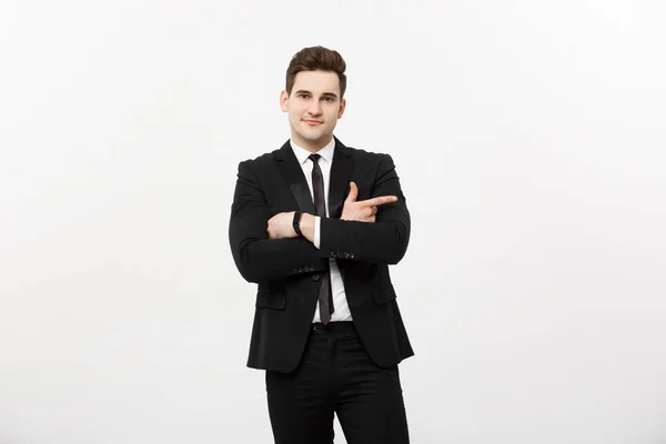 Schöner junger Geschäftsmann glücklich lächeln Zeigefinger auf leeren Kopierraum, Geschäftsmann zeigt Zeigefinger, Konzept der Werbung Produkt, isoliert über weißem Hintergrund — Stockfoto