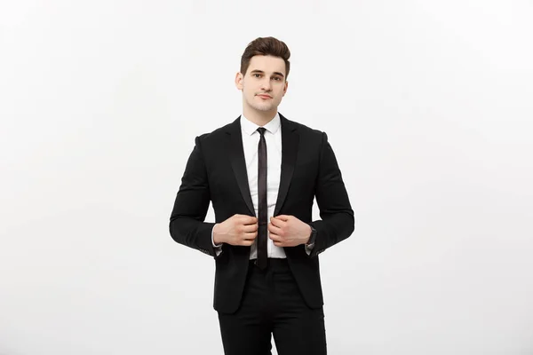 Business Concept: Handsome Man Happy Smile Young Handsome Guy in smart suit posing over Isolated Grey Background. — Stock Photo, Image