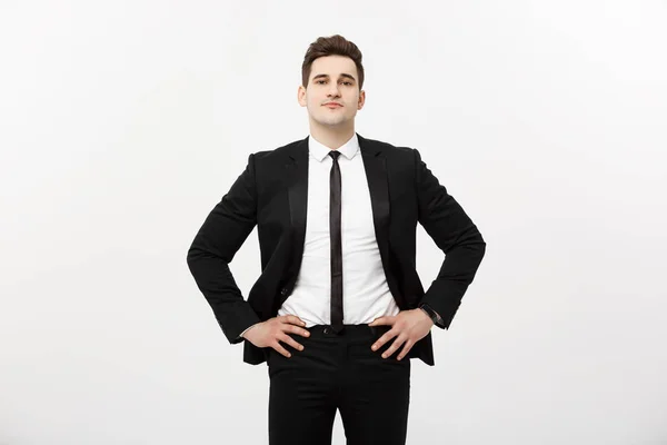 Business Concept: Handsome Man Happy Smile Young Handsome Guy in smart suit posing over Isolated Grey Background. — Stock Photo, Image