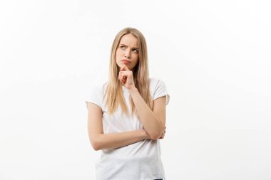 Portrait young serious caucasian woman thinking of something. Isolated on white copy space background. clipart